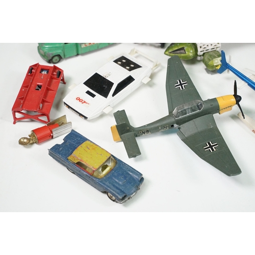 1425 - 20 Mid 20th C playworn diecast models to include mainly TV / Film related examples featuring Corgi a... 