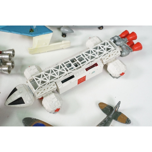 1425 - 20 Mid 20th C playworn diecast models to include mainly TV / Film related examples featuring Corgi a... 