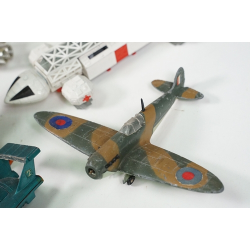 1425 - 20 Mid 20th C playworn diecast models to include mainly TV / Film related examples featuring Corgi a... 
