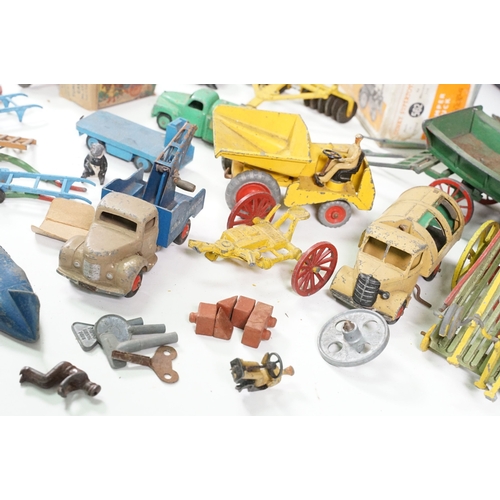 1428 - Collection of Mid 20th C playworn diecast models including mainly farming related examples featuring... 