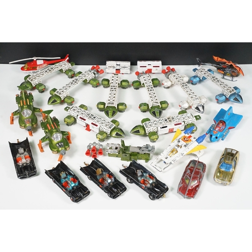 1437 - Over 20 Mid 20th C play worn Sci Fi & TV related diecast models to include Dinky Eagle, Corgi Batmob... 