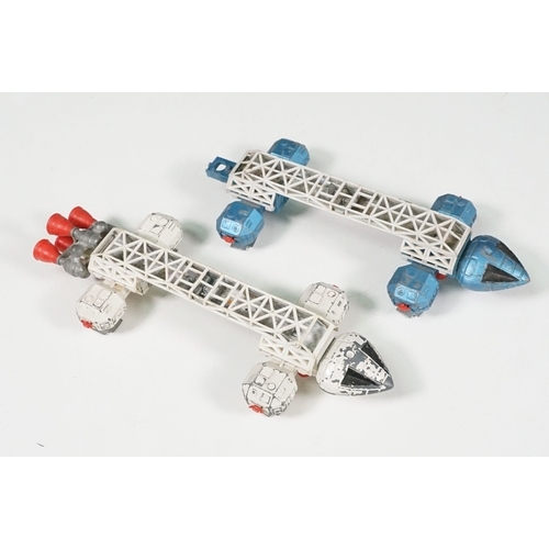 1437 - Over 20 Mid 20th C play worn Sci Fi & TV related diecast models to include Dinky Eagle, Corgi Batmob... 