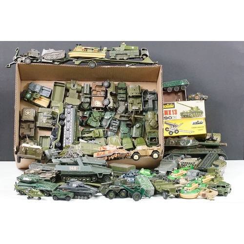1440 - Over 75 Mid 20th C play worn diecast and metal military models to include2 x boxed Solido examples (... 
