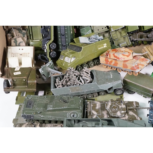 1440 - Over 75 Mid 20th C play worn diecast and metal military models to include2 x boxed Solido examples (... 