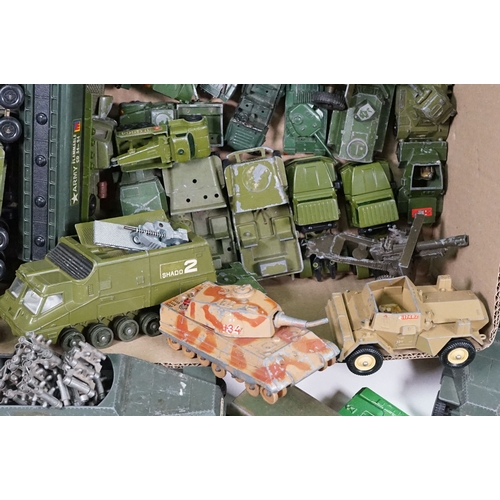 1440 - Over 75 Mid 20th C play worn diecast and metal military models to include2 x boxed Solido examples (... 