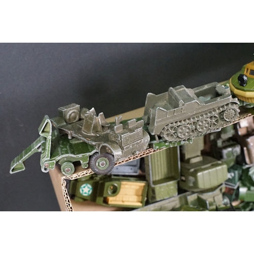 1440 - Over 75 Mid 20th C play worn diecast and metal military models to include2 x boxed Solido examples (... 