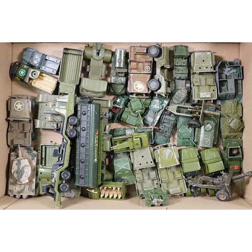 1440 - Over 75 Mid 20th C play worn diecast and metal military models to include2 x boxed Solido examples (... 