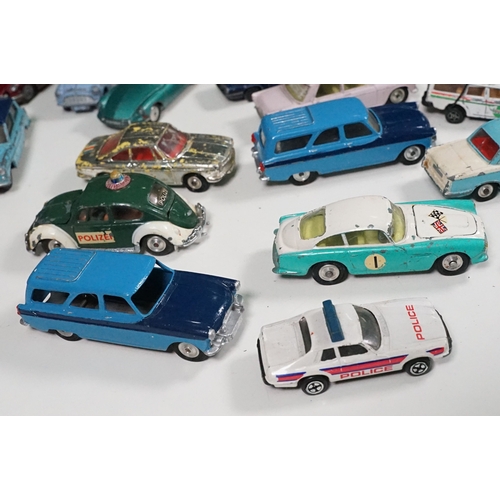 1442 - Around 40 play worn Mid 20th C Corgi diecast models to include Volkswagen Toblerone, Tour de France ... 