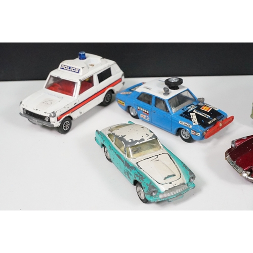 1442 - Around 40 play worn Mid 20th C Corgi diecast models to include Volkswagen Toblerone, Tour de France ... 
