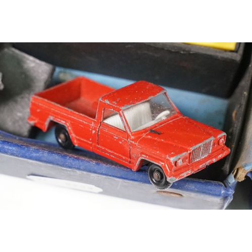 Over 70 play worn Matchbox diecast models contained within 2 x Matchbox ...