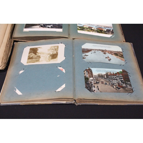 A collection of early 20th century real photo and printed postcards ...
