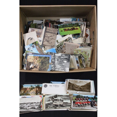 A large collection of early to late 20th century printed and real photo ...