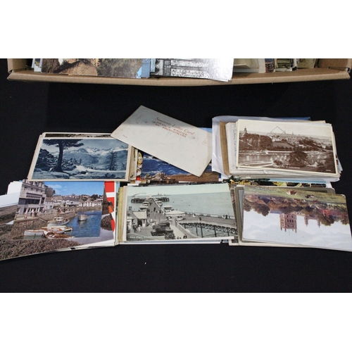 A large collection of early to late 20th century printed and real photo ...