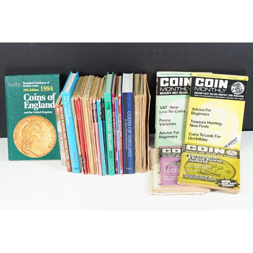 428 - A collection of mixed coin related books and ephemera to include price guides and magazines.