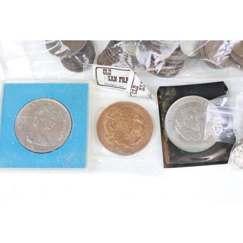 426 - A collection of mainly British pre decimal coins to include Queen Victoria and silver examples toget... 