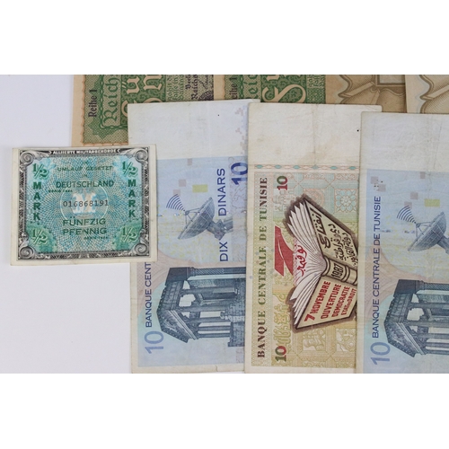 423 - A collection of early to mid 20th century German banknotes to include over inflation and emergency i... 