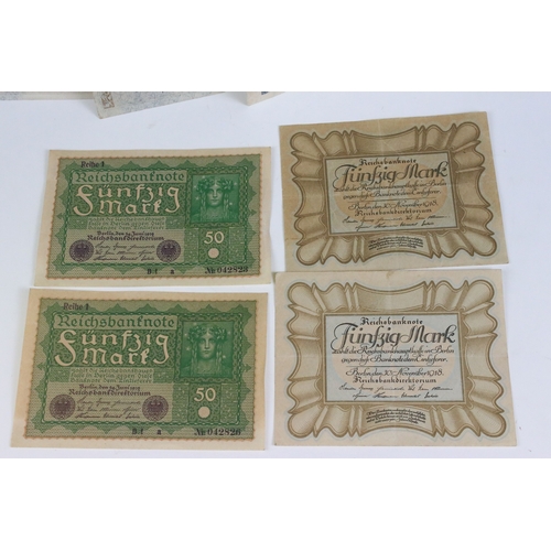 423 - A collection of early to mid 20th century German banknotes to include over inflation and emergency i... 