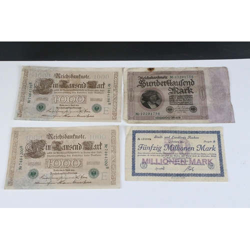 423 - A collection of early to mid 20th century German banknotes to include over inflation and emergency i... 