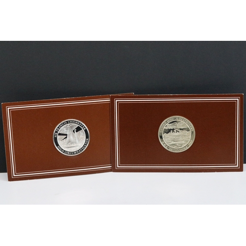 424 - Two fully hallmarked sterling silver medallions by John Pinches to include H.M.S. Devonshire 1960 gu... 