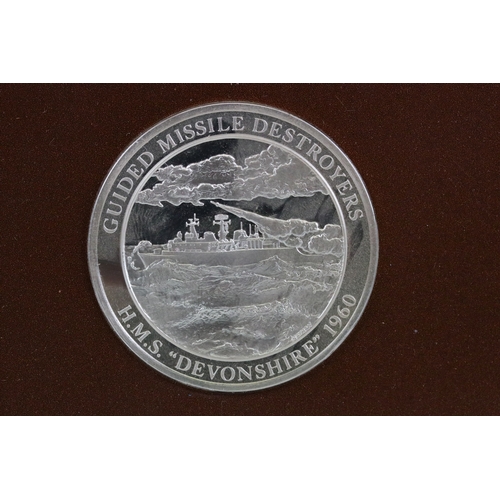424 - Two fully hallmarked sterling silver medallions by John Pinches to include H.M.S. Devonshire 1960 gu... 