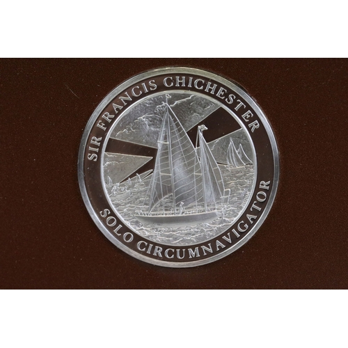 424 - Two fully hallmarked sterling silver medallions by John Pinches to include H.M.S. Devonshire 1960 gu... 