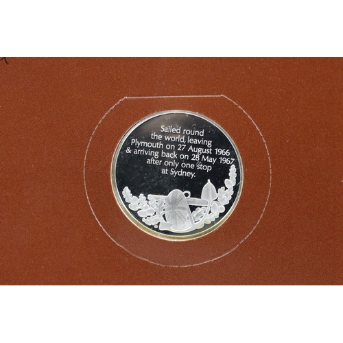 424 - Two fully hallmarked sterling silver medallions by John Pinches to include H.M.S. Devonshire 1960 gu... 