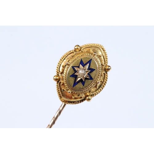185 - Group of three 19th Century stick pins to include a yellow metal example with pearl and enamel finia... 