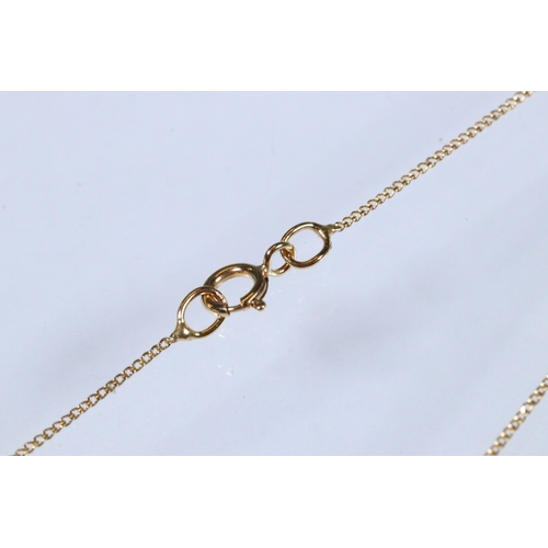 227 - 9ct gold and pendant necklace having a fine link chain with a pear cut opal cabochon (marked marked ... 