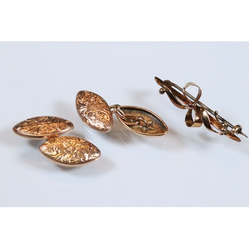 221 - Pair of 9ct gold cufflinks having engraved navette shaped heads united by chains (hallmarked Birming... 