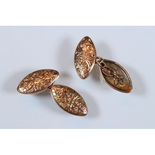 221 - Pair of 9ct gold cufflinks having engraved navette shaped heads united by chains (hallmarked Birming... 
