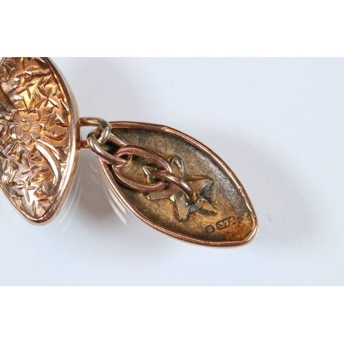 221 - Pair of 9ct gold cufflinks having engraved navette shaped heads united by chains (hallmarked Birming... 