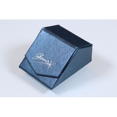 234 - 9ct white gold and blue topaz dress ring being set with an oval mixed cut topaz with pierced and scr... 