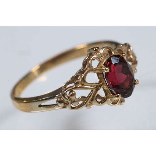 236 - 9ct gold and and pink tourmaline ring. The ring being set with an oval mixed cut tourmaline within a... 