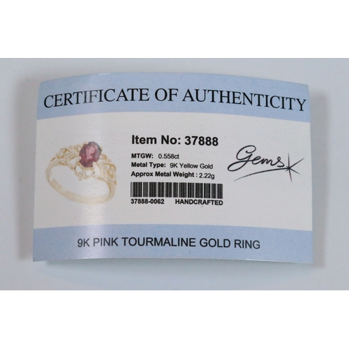 236 - 9ct gold and and pink tourmaline ring. The ring being set with an oval mixed cut tourmaline within a... 