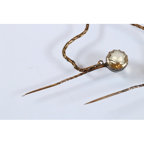 28 - Pair of 19th Century stick pins set with a round mixed cut amethyst and round mixed cut citrine unit... 
