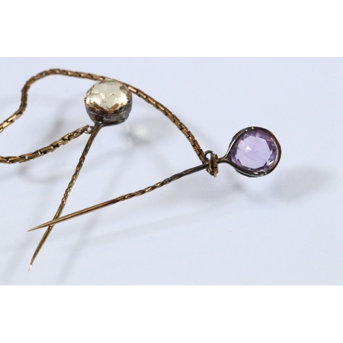 28 - Pair of 19th Century stick pins set with a round mixed cut amethyst and round mixed cut citrine unit... 