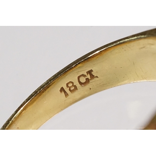 24 - 18ct gold, opal and diamond ring. The ring being set with three oval opal cabochons with six diamond... 