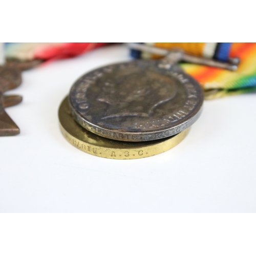 433 - A British World War One / WW1 full size medal trio to include Victory medal, British War medal and t... 