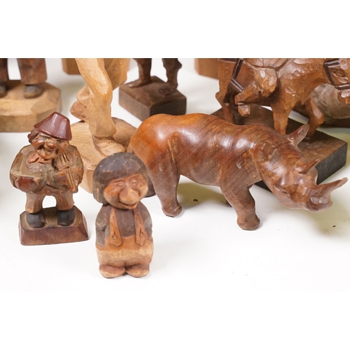 Large collection of carved mixed wood figurines and animals sculptures ...