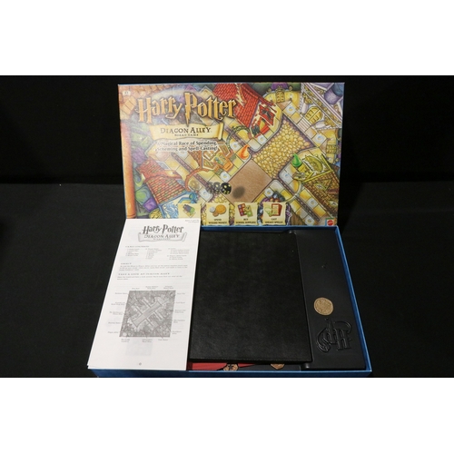 64 - 23 Boxed TV / Film / Sci Fi board games to include Parker Captain Planet, Parker Jurassic Park, Park... 