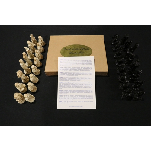 71 - Boxed Tolkien Enterprises 1994 Lord of the Rings Chess Set pieces with paperwork, no board