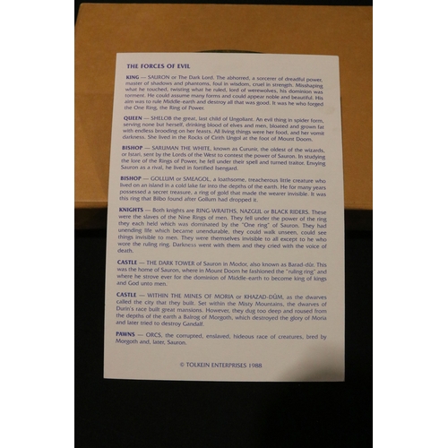 71 - Boxed Tolkien Enterprises 1994 Lord of the Rings Chess Set pieces with paperwork, no board