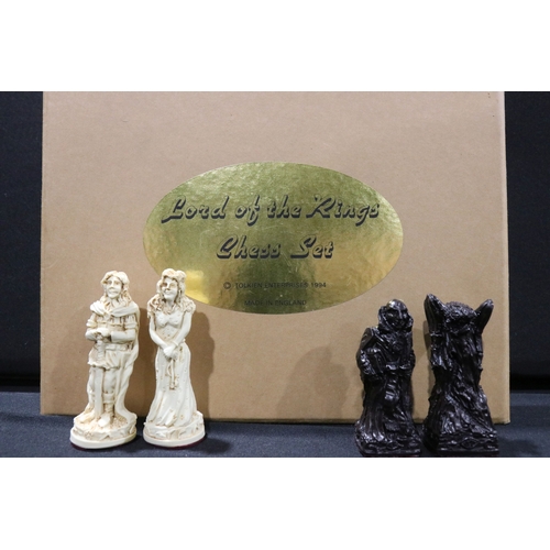 71 - Boxed Tolkien Enterprises 1994 Lord of the Rings Chess Set pieces with paperwork, no board