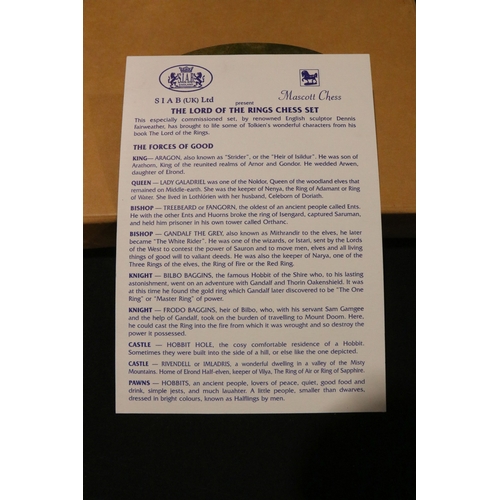 71 - Boxed Tolkien Enterprises 1994 Lord of the Rings Chess Set pieces with paperwork, no board