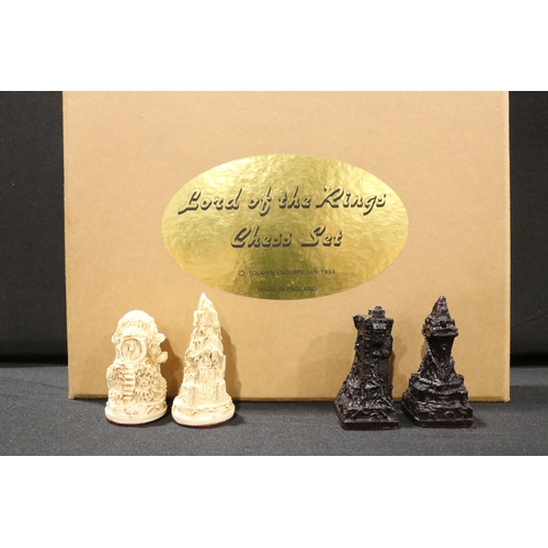 71 - Boxed Tolkien Enterprises 1994 Lord of the Rings Chess Set pieces with paperwork, no board
