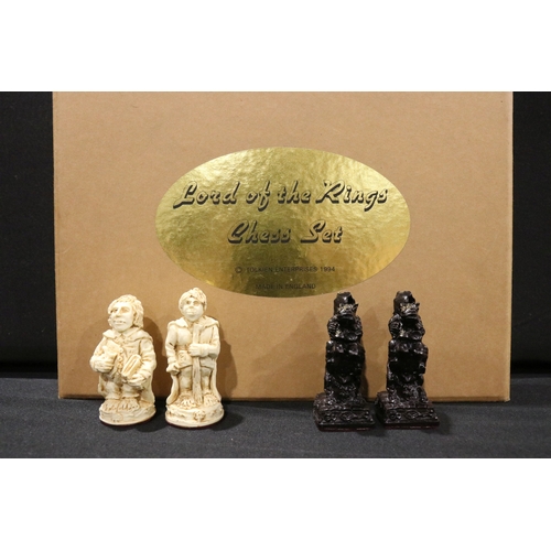 71 - Boxed Tolkien Enterprises 1994 Lord of the Rings Chess Set pieces with paperwork, no board