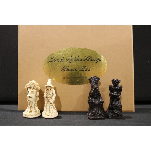 71 - Boxed Tolkien Enterprises 1994 Lord of the Rings Chess Set pieces with paperwork, no board