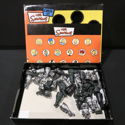 62 - Four boxed TV related chess sets to include DC Super Heroes, The Simpsons 'Antiqued metal style', St... 
