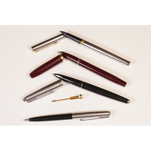 A small collection of ballpoint and fountain pens to include Parker and ...