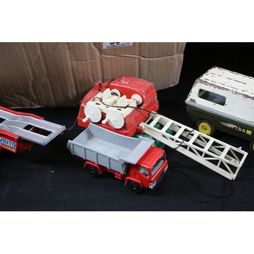 304 - Large collection of play worn diecast models to include Matchbox, Corgi, Siku etc (2 boxes)